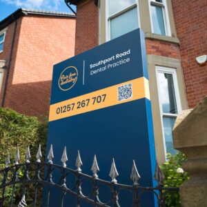 pain free dentistry monolith totem sign