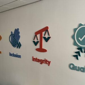 indoor signs mounted to an office wall